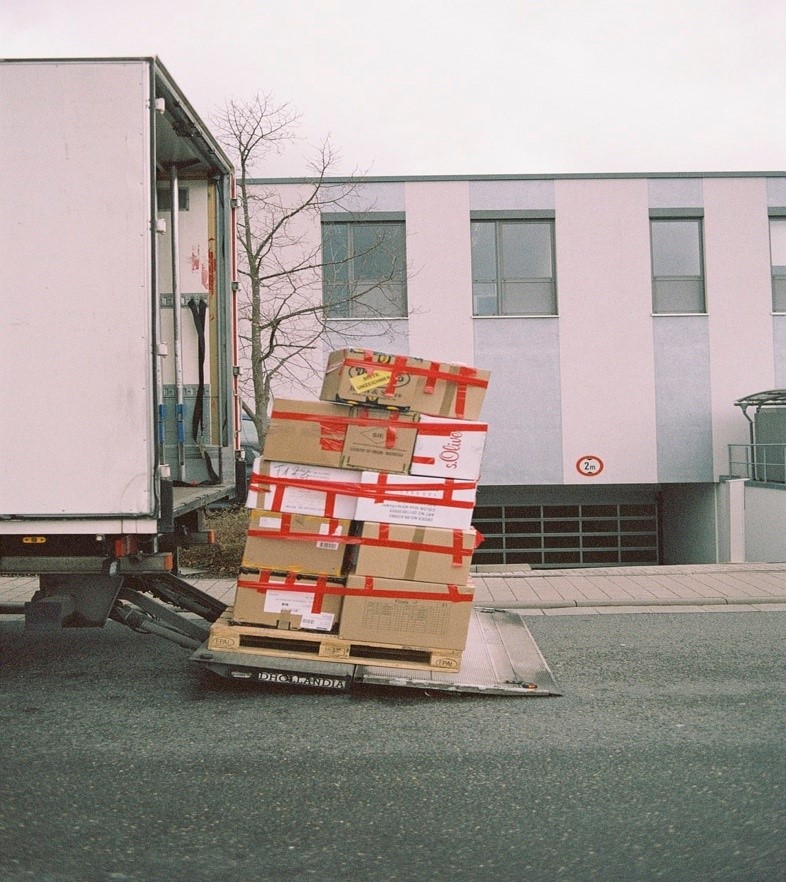 A Stack of Taped Packages Waiting to be Loaded on a Truck